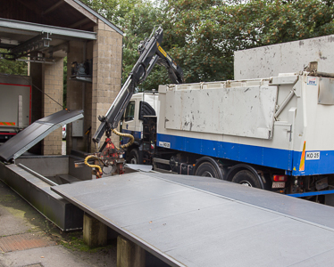 The rendering plant removes the cadavers from the refrigerated bin