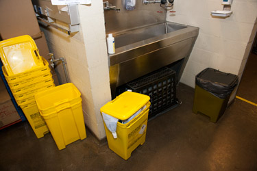 Yellow waste containers in the storeroom of the surgery unit