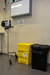 Yellow waste containers in the surgery room