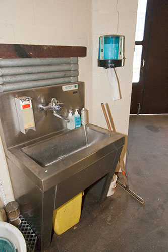 Sink and soap dispenser and disinfectant in the consulting room